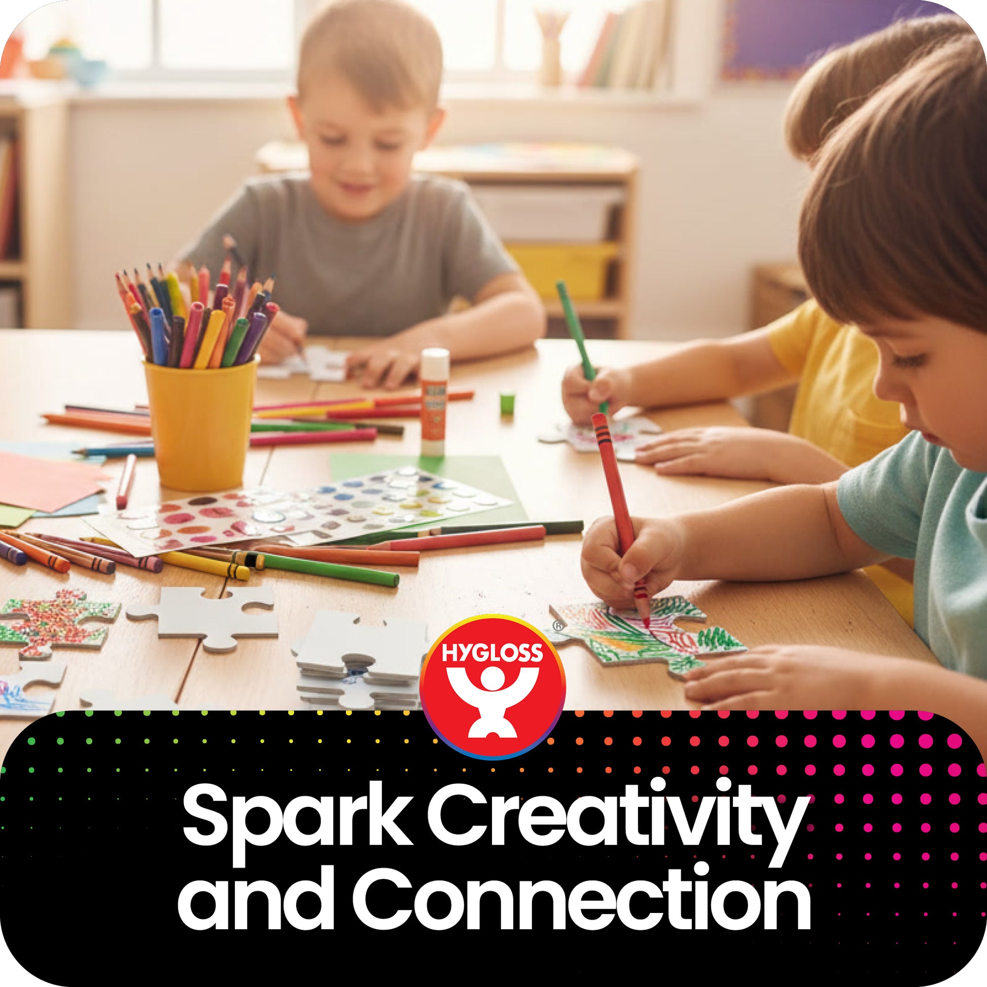 Children decorating the junior community puzzle at a table with Hygloss products, featuring the brand logo and tagline.

